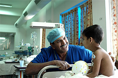Narayana Hrudayalaya doctor with patient, NextBillion Health Care